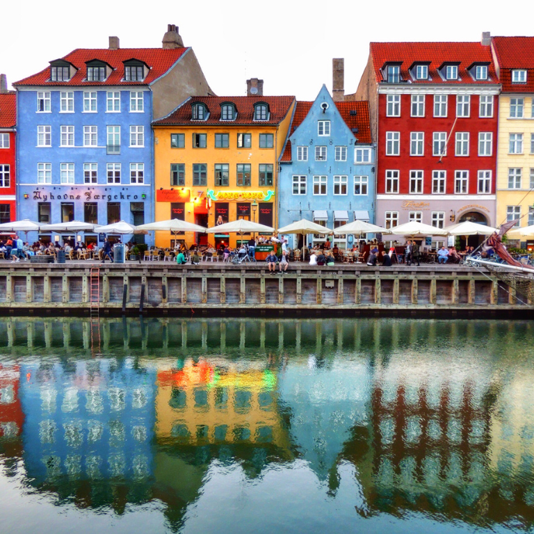 View of a busy street in Denmark overlooking the water